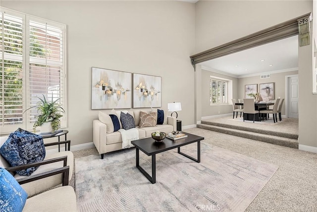 45 Colonial, Irvine, CA 92620 - carpeted living area featuring baseboards and crown molding