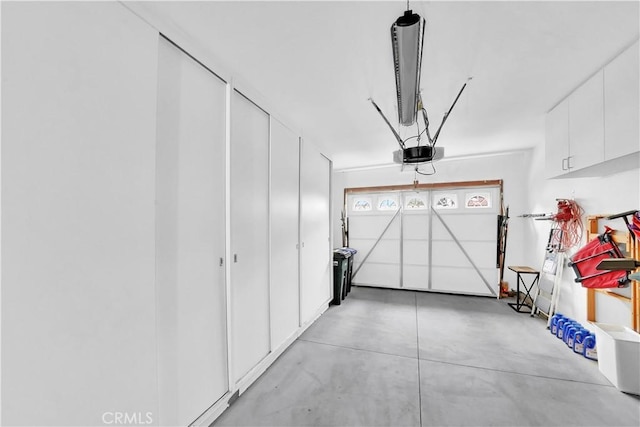 5509 Paseo Del Lago W Unit C, Laguna Woods, CA 92637 - garage with a garage door opener