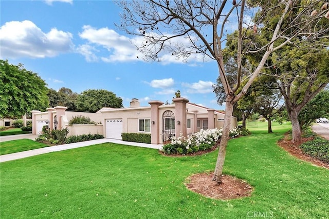 5509 Paseo Del Lago W Unit C, Laguna Woods, CA 92637 - mediterranean / spanish-style house featuring a garage, driveway, a front yard, stucco siding, and a chimney