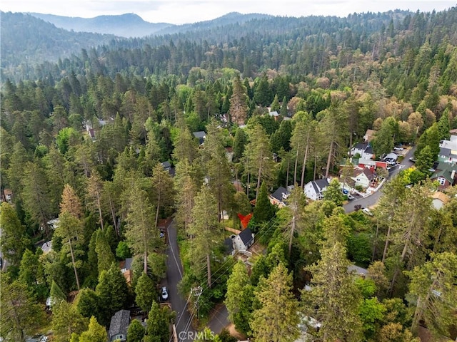 423 Forest Ln, Crestline, CA 92325 - view of property location with a heavily wooded area and a mountainous background