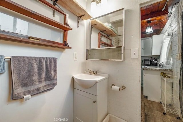 423 Forest Ln, Crestline, CA 92325 - bathroom featuring vanity and wood finished floors