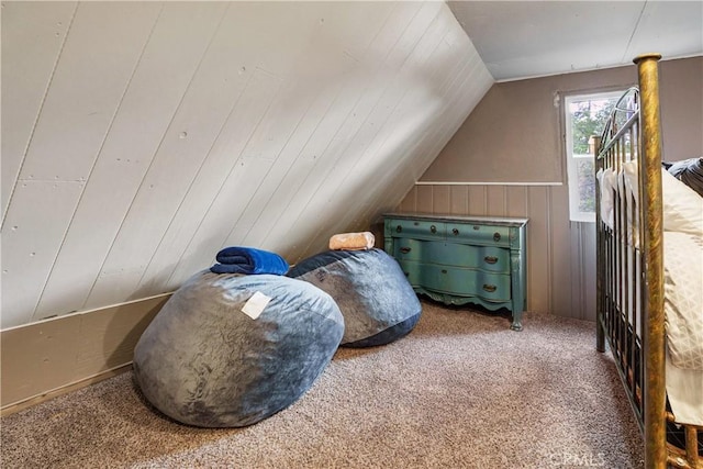 423 Forest Ln, Crestline, CA 92325 - additional living space with vaulted ceiling, carpet floors, and wood walls
