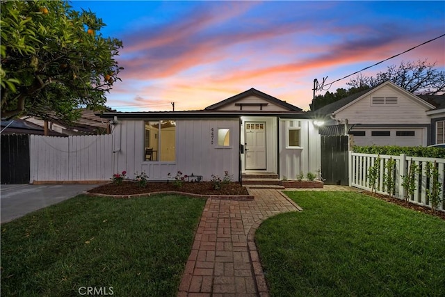 4470 Colbath Ave, Sherman Oaks, CA 91423 - view of front facade with board and batten siding and an attached garage
