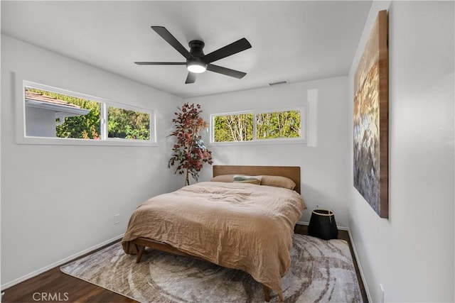 4470 Colbath Ave, Sherman Oaks, CA 91423 - bedroom with baseboards, wood finished floors, and ceiling fan