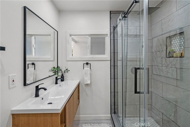 4470 Colbath Ave, Sherman Oaks, CA 91423 - full bath with double vanity, a stall shower, and baseboards