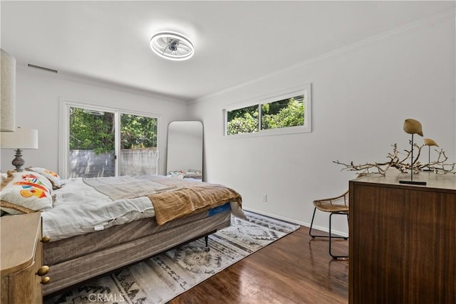 4470 Colbath Ave, Sherman Oaks, CA 91423 - bedroom featuring crown molding, multiple windows, wood finished floors, baseboards, and arched walkways