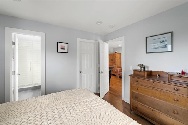 1526 Garden St, San Luis Obispo, CA 93401 - bedroom with dark wood-style floors and ensuite bathroom