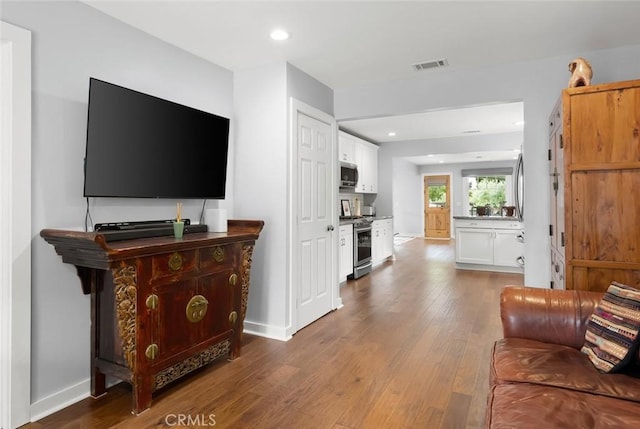 1526 Garden St, San Luis Obispo, CA 93401 - living room featuring hardwood / wood-style floors and recessed lighting