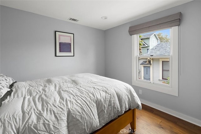 1526 Garden St, San Luis Obispo, CA 93401 - bedroom featuring wood finished floors and baseboards