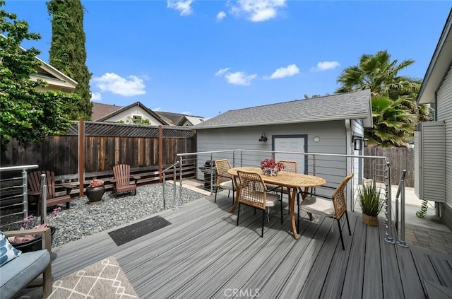 1526 Garden St, San Luis Obispo, CA 93401 - wooden deck with outdoor dining area and a fenced backyard