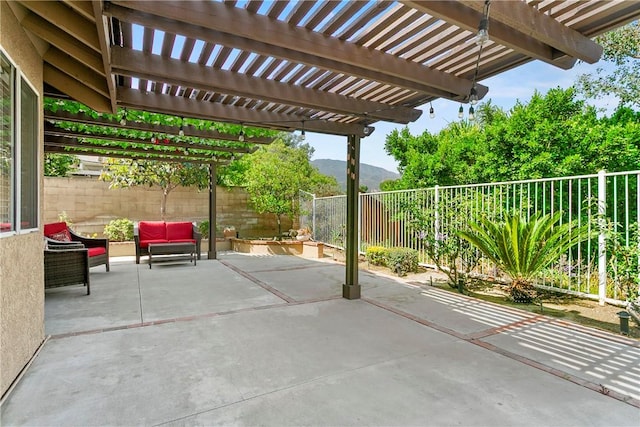 902 Highland View Dr, Corona, CA 92882 - fenced backyard featuring a mountain view, a patio, a pergola, and an outdoor living space