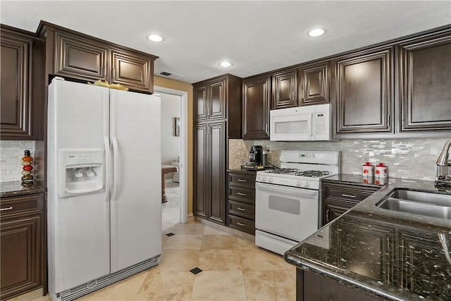 902 Highland View Dr, Corona, CA 92882 - kitchen featuring white appliances, a sink, dark stone counters, backsplash, and recessed lighting