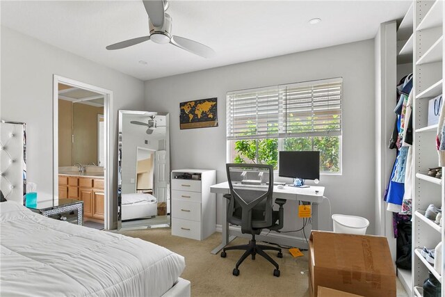 902 Highland View Dr, Corona, CA 92882 - bedroom with light colored carpet, a desk, a sink, ensuite bathroom, and a ceiling fan