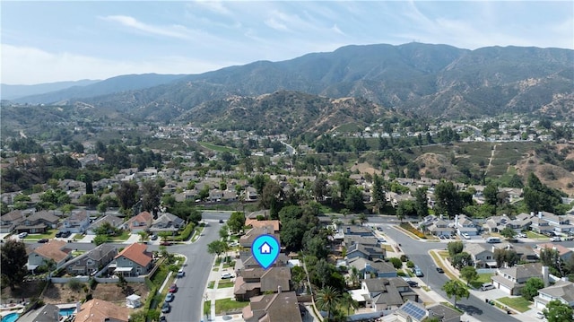 902 Highland View Dr, Corona, CA 92882 - aerial overview of property's location with mountains and nearby suburban area
