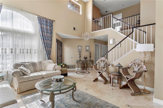902 Highland View Dr, Corona, CA 92882 - living area featuring baseboards, stairway, a high ceiling, and tile patterned floors