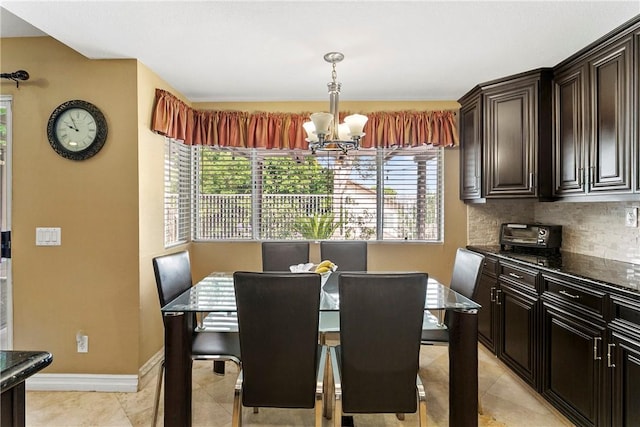 902 Highland View Dr, Corona, CA 92882 - dining area featuring a chandelier, plenty of natural light, light tile patterned floors, and baseboards