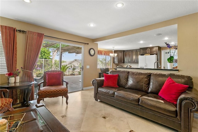 902 Highland View Dr, Corona, CA 92882 - living room with a chandelier, recessed lighting, light tile patterned flooring, and baseboards
