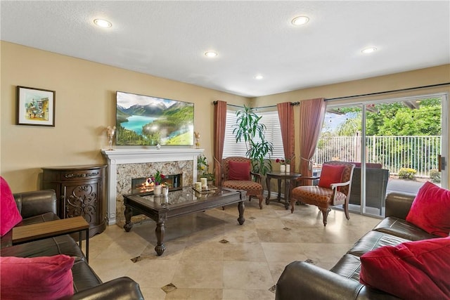 902 Highland View Dr, Corona, CA 92882 - living room with a high end fireplace and recessed lighting