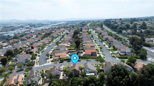 902 Highland View Dr, Corona, CA 92882 - aerial view of property's location featuring nearby suburban area and a mountainous background