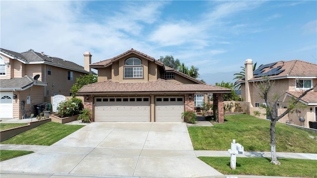 902 Highland View Dr, Corona, CA 92882 - traditional home with concrete driveway, a front lawn, a garage, brick siding, and stucco siding