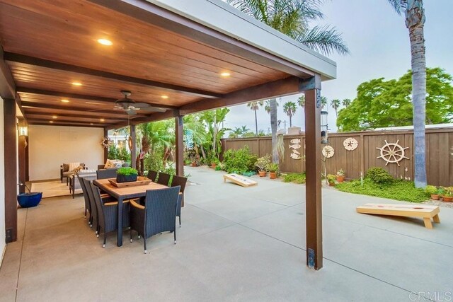 1530 Stewart St, Oceanside, CA 92054 - fenced backyard with a patio area, outdoor dining space, and a ceiling fan