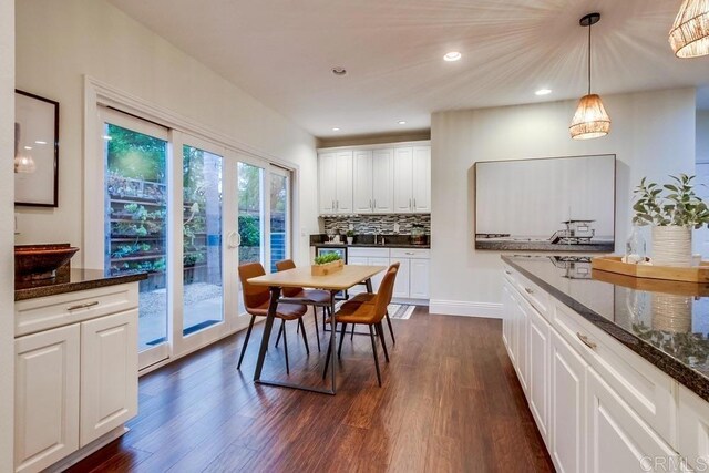 1530 Stewart St, Oceanside, CA 92054 - dining room with dark wood finished floors and recessed lighting
