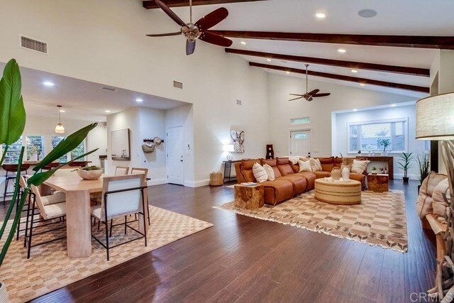 1530 Stewart St, Oceanside, CA 92054 - living area with a ceiling fan, wood finished floors, beamed ceiling, recessed lighting, and high vaulted ceiling