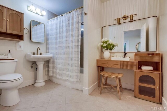1530 Stewart St, Oceanside, CA 92054 - full bathroom with toilet, tile patterned floors, shower / bathtub combination with curtain, and baseboards