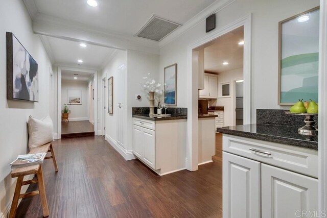 1530 Stewart St, Oceanside, CA 92054 - corridor featuring ornamental molding, dark wood-type flooring, and recessed lighting