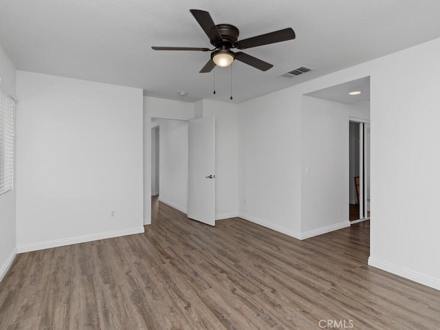 26230 Monticello Way, Murrieta, CA 92563 - spare room with ceiling fan, wood finished floors, and baseboards