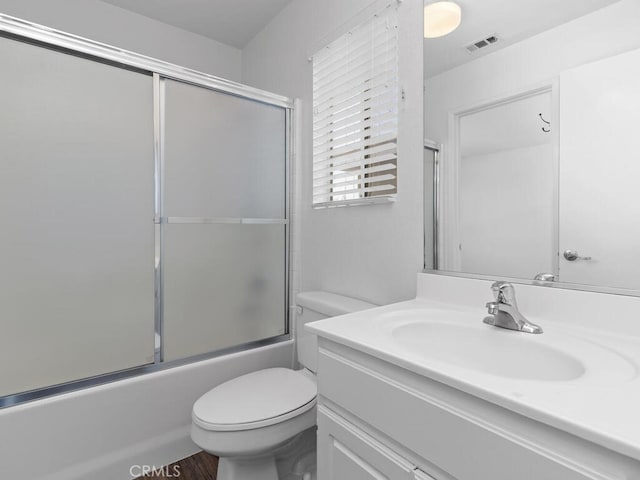 26230 Monticello Way, Murrieta, CA 92563 - full bath featuring vanity, toilet, enclosed tub / shower combo, and wood finished floors