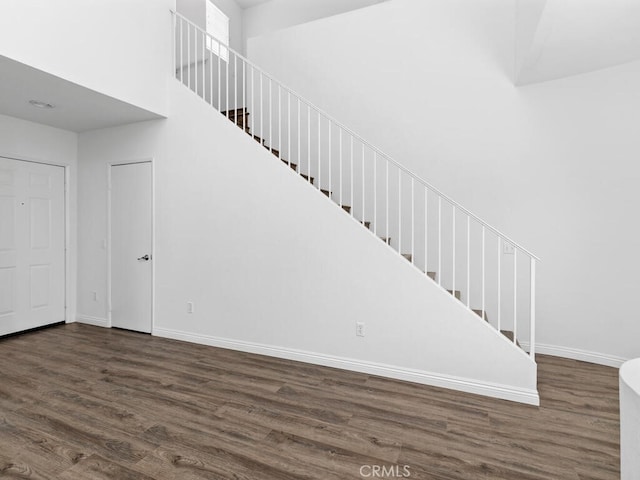26230 Monticello Way, Murrieta, CA 92563 - stairs with wood finished floors, baseboards, and a high ceiling
