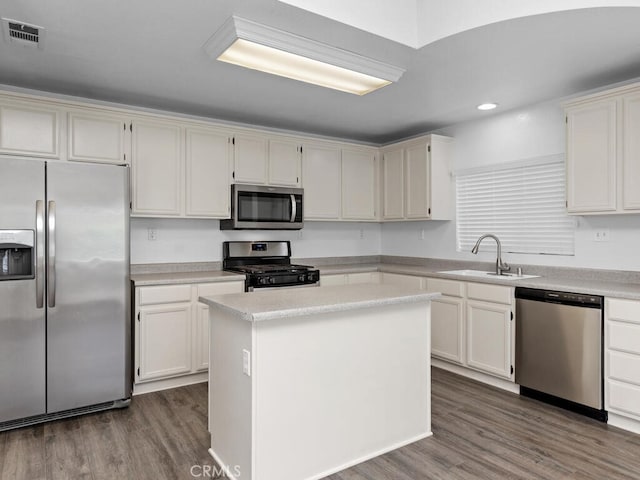 26230 Monticello Way, Murrieta, CA 92563 - kitchen featuring appliances with stainless steel finishes, a sink, dark wood-type flooring, recessed lighting, and light countertops