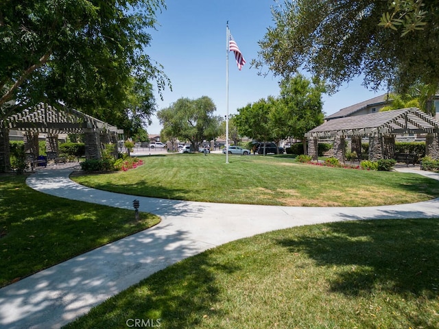 26230 Monticello Way, Murrieta, CA 92563 - view of property's community with a yard and a pergola