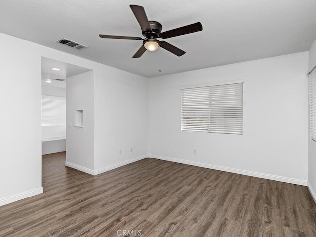 26230 Monticello Way, Murrieta, CA 92563 - empty room with a ceiling fan, wood finished floors, and baseboards