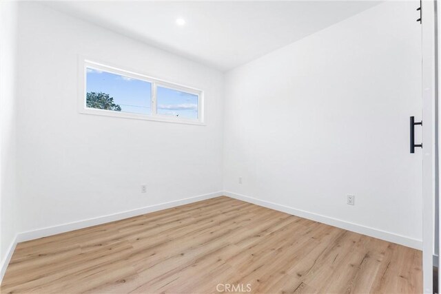 2731 Armour Ln, Redondo Beach, CA 90278 - empty room featuring wood finished floors and baseboards