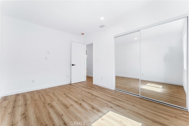 2731 Armour Ln, Redondo Beach, CA 90278 - unfurnished bedroom featuring light wood finished floors, a closet, and recessed lighting