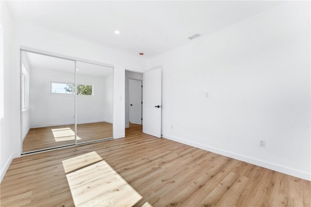 2731 Armour Ln, Redondo Beach, CA 90278 - unfurnished bedroom with light wood-style flooring, a closet, and recessed lighting