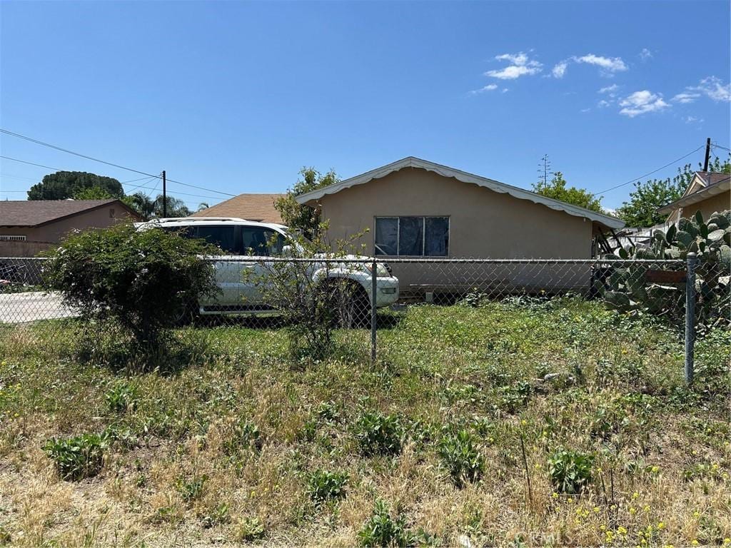3840 June St, San Bernardino, CA 92407 - view of property exterior with stucco siding