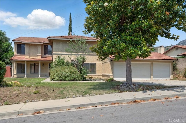 918 Sequoia Ct, San Dimas, CA 91773 - mediterranean / spanish home with a garage, concrete driveway, stucco siding, a tiled roof, and a front lawn
