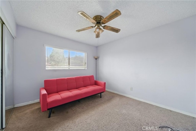 918 Sequoia Ct, San Dimas, CA 91773 - sitting room featuring ceiling fan, carpet, baseboards, and a textured ceiling