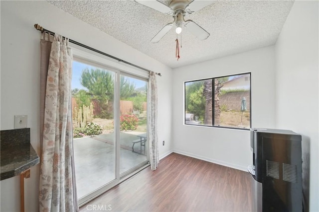 918 Sequoia Ct, San Dimas, CA 91773 - spare room featuring a textured ceiling, wood finished floors, baseboards, and a ceiling fan