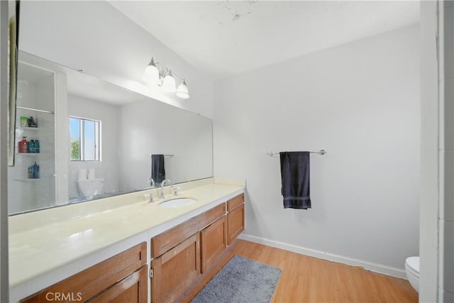 918 Sequoia Ct, San Dimas, CA 91773 - full bathroom featuring wood finished floors, vanity, toilet, a shower, and baseboards