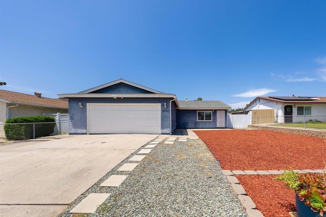 8644 Spring Vista Way, Spring Valley, CA 91977 - ranch-style house featuring an attached garage, stucco siding, and concrete driveway