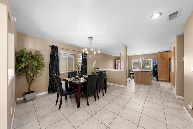 8644 Spring Vista Way, Spring Valley, CA 91977 - dining area featuring a chandelier, light tile patterned floors, and baseboards