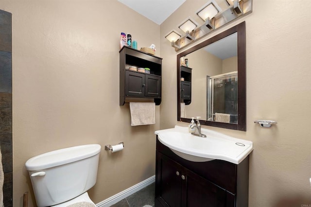 8644 Spring Vista Way, Spring Valley, CA 91977 - bathroom with vanity, toilet, an enclosed shower, and baseboards