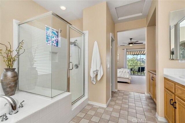 30 Sunswept Mesa, Aliso Viejo, CA 92656 - ensuite bathroom with vanity, a shower stall, tile patterned floors, a bath, and a ceiling fan