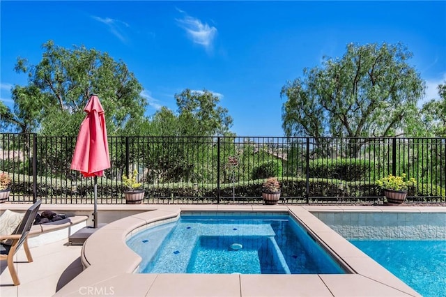 30 Sunswept Mesa, Aliso Viejo, CA 92656 - view of swimming pool with an in-ground hot tub