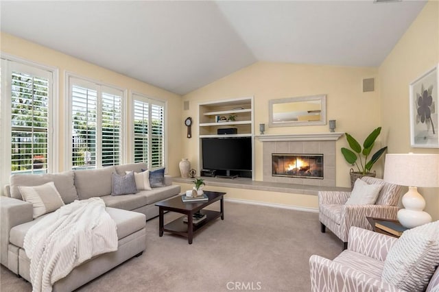 30 Sunswept Mesa, Aliso Viejo, CA 92656 - carpeted living room featuring vaulted ceiling, built in features, and a fireplace