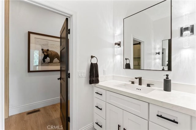1019 Pintail Cir, Lake Arrowhead, CA 92352 - bathroom featuring wood finished floors and vanity